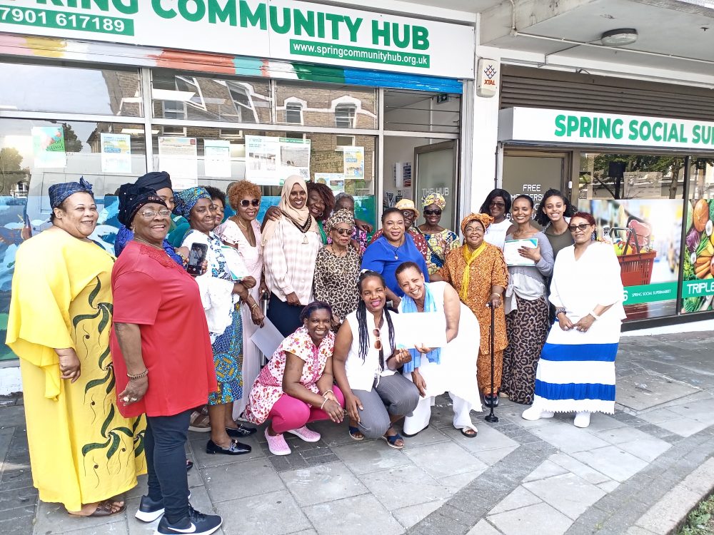 A group of women outside Spring Community Hub